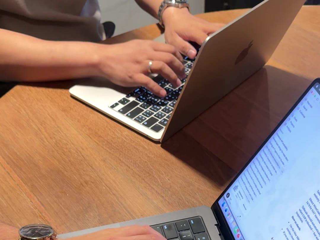 Hands-on data and automation work at a laptop